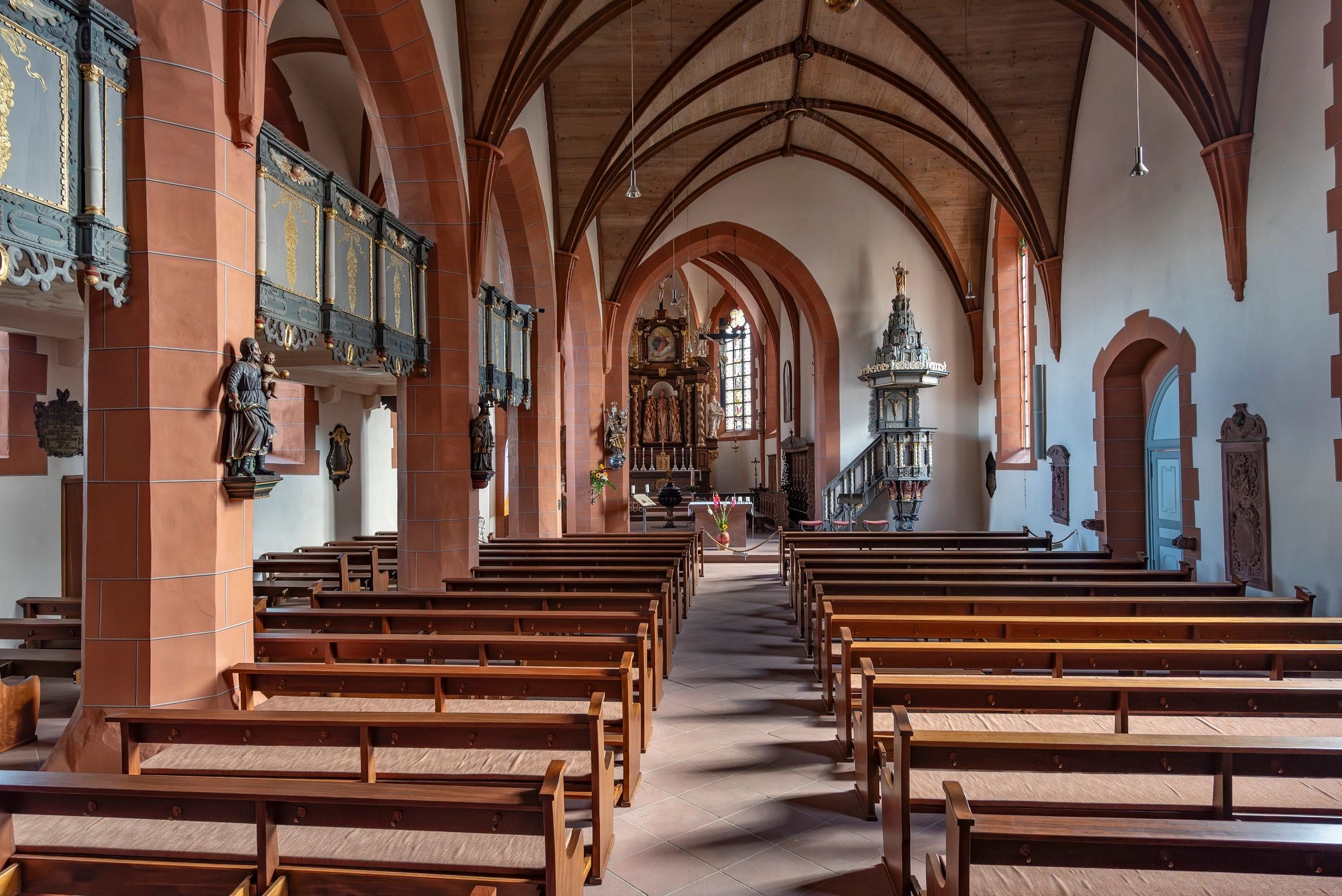Church interior with altar and quiet devotional atmosphere